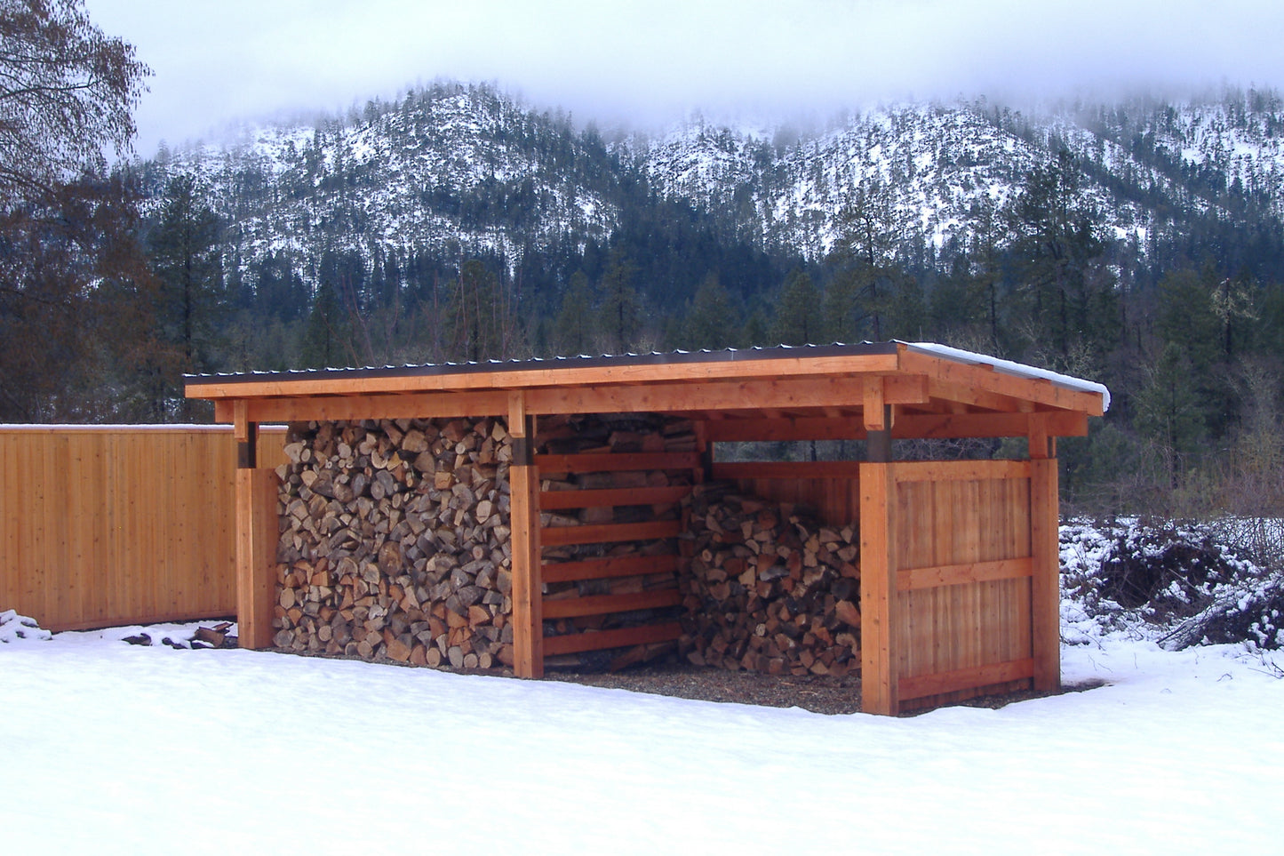 8'x16' divided woodshed kit with !0'x20' metal roof